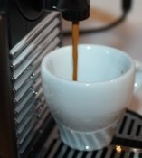 The Nespresso Pixie pouring a beautiful espresso